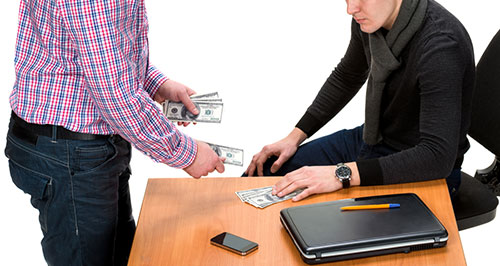 men exchanging money